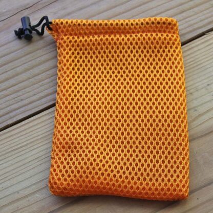 The FREE Orange Cigar Ball Nylon Bag can attach to your golf bag to keep your Cigar Balls close.