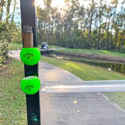 Matching pair green major brand Callaway Cigar Balls