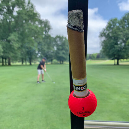 Rest your expensive cigar in the Red Cigar Balls holder.