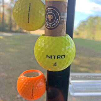 Generic Cigar Balls attached to cart holding Montecristo cigar